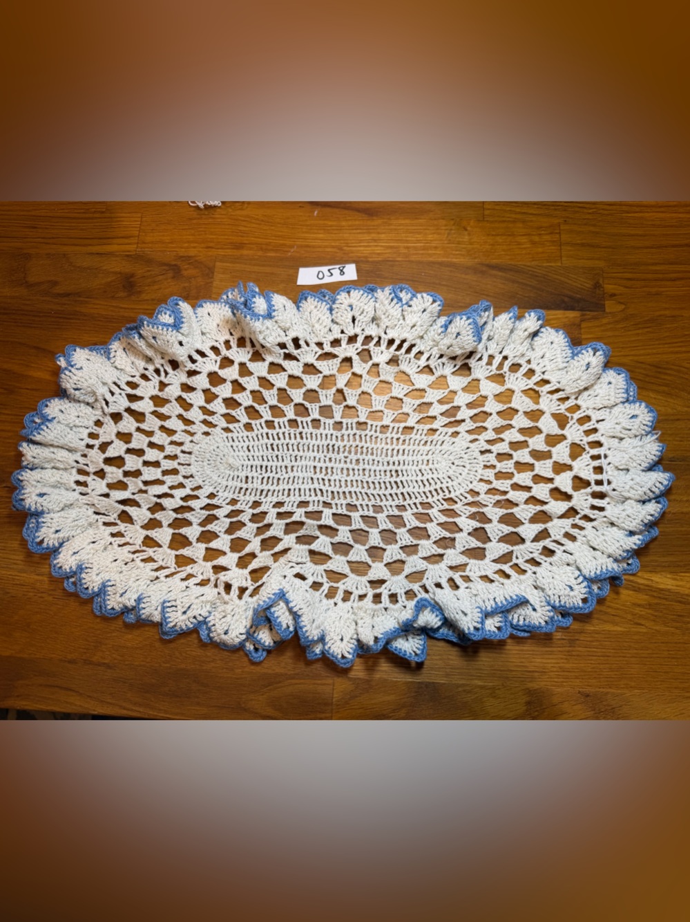 Hand-Crocheted Oval Doily in Cream with Blue Trim